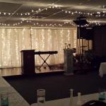 Twinkle hanging lights & Sheer white twinkle backdrop for your church event!